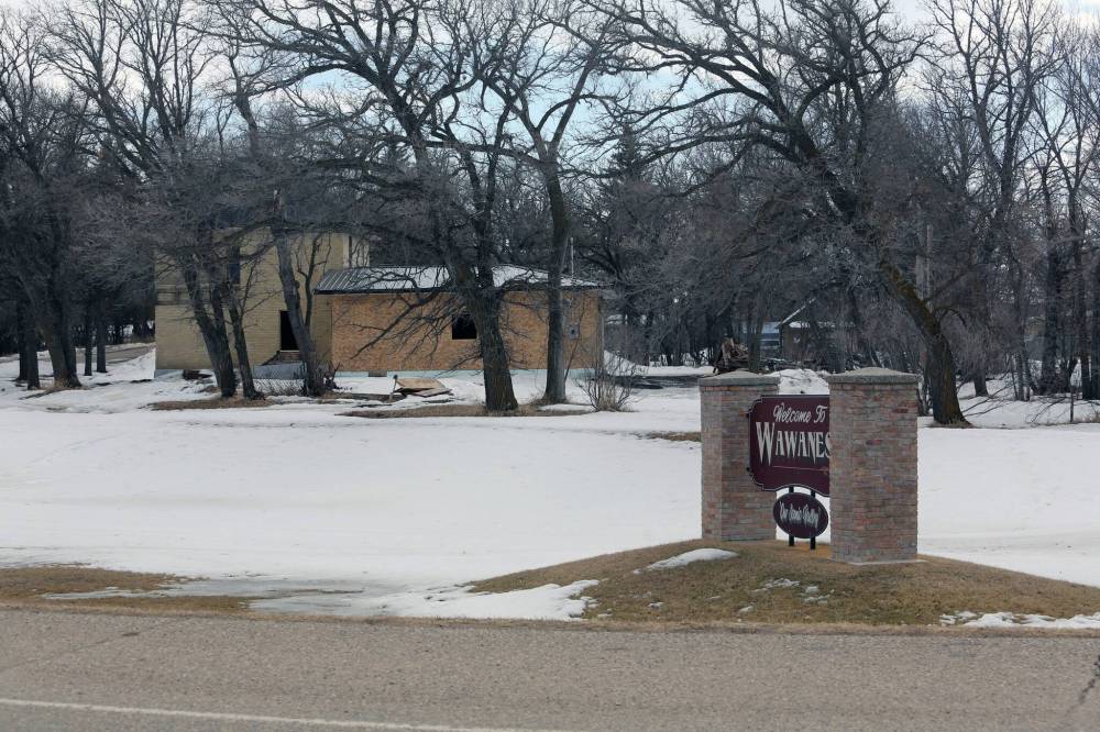 An abandoned home neighbouring the entrance to Wawanesa is seen in March. A local retiree, Neil Friesen, has bought the home and plans to build it back to be livable again before putting it up for sale. (Connor McDowell/Brandon Sun)