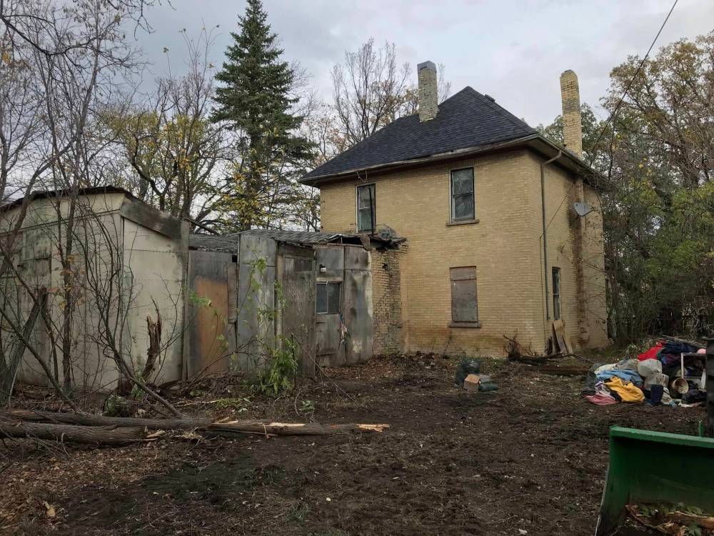 The back corner of the house is seen before renovations. (Photo: Neil Friesen)
