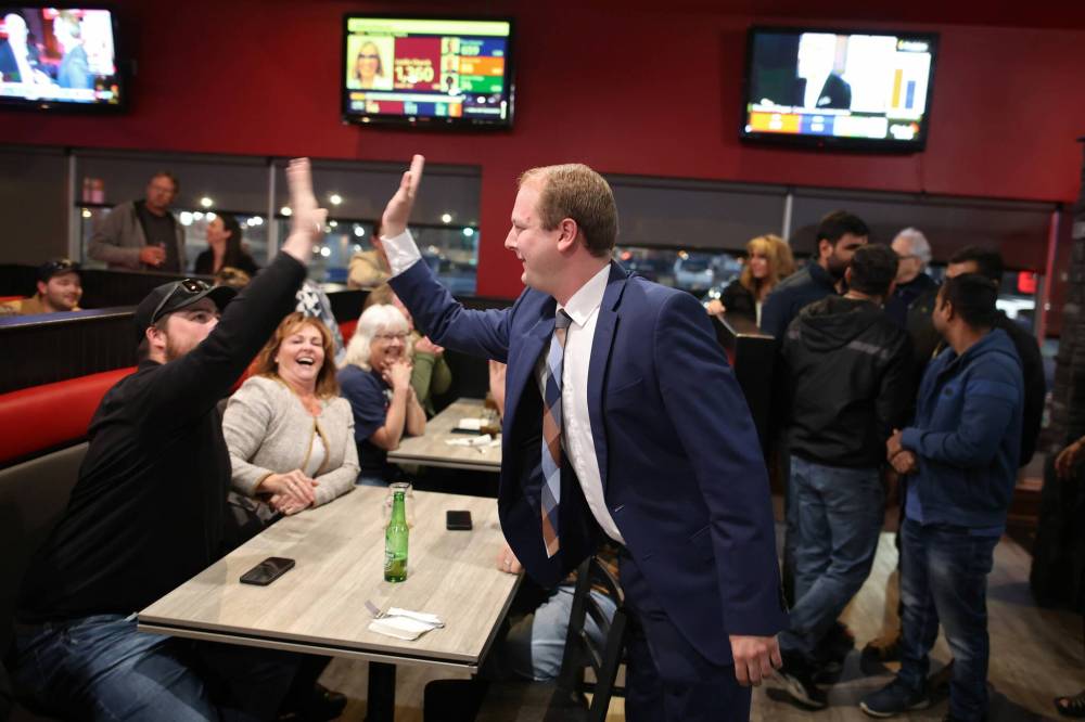 Brandon-Souris Conservative Party of Canada candidate Grant Jackson greets supporters at his campaign party in Brandon on Monday evening. (Tim Smith/The Brandon Sun)
