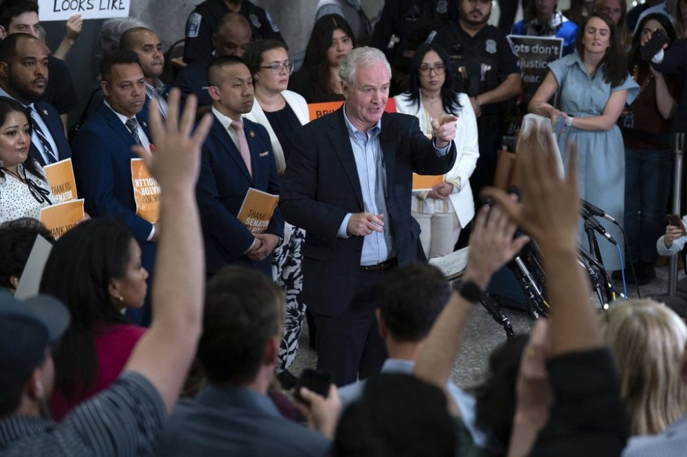 Sen. Chris Van Hollen, D-Md., speaks during a news conference upon his arrival from meeting with Kilmar Abrego Garcia in El Salvador, at Washington Dulles International Airport, in Chantilly, Va., Friday, April 18, 2025. (AP Photo/Jose Luis Magana)