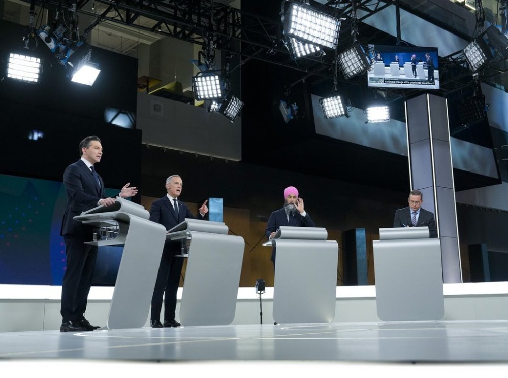 Conservative Leader Pierre Poilievre, left to right, Liberal Leader Mark Carney and New Democratic Party Leader Jagmeet Singh and Bloc Québécois Leader Yves-Francois Blanchet participate in the English-language federal leaders' debate in Montreal, Thursday, April 17, 2025. THE CANADIAN PRESS/Adrian Wyld