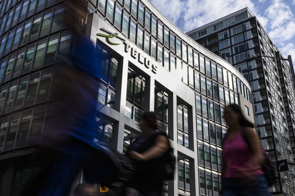 A new report says Telus Corp. is the most complained-about telecommunications service provider in Canada so far this year, as overall grievances by customers continue to rise. People pass by the Telus offices in Ottawa on Friday, Aug. 4, 2023. THE CANADIAN PRESS/Justin Tang