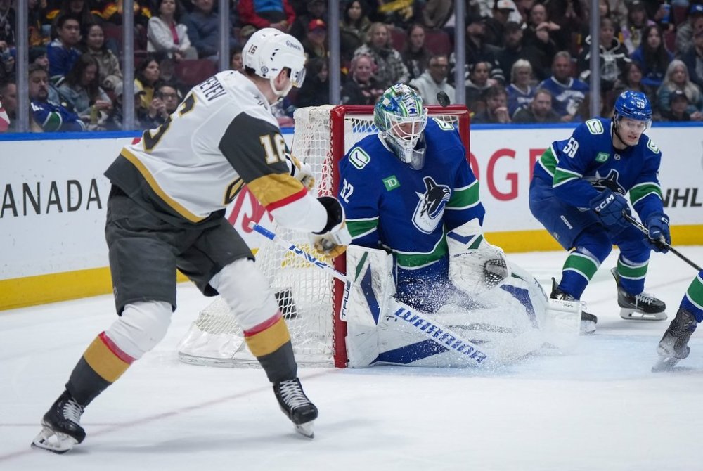 Vancouver Canucks goalie Kevin Lankinen (32) stops Vegas Golden Knights' Pavel Dorofeyev (16) during the second period of an NHL hockey game in Vancouver, on Wednesday, April 16, 2025. THE CANADIAN PRESS/Darryl Dyck