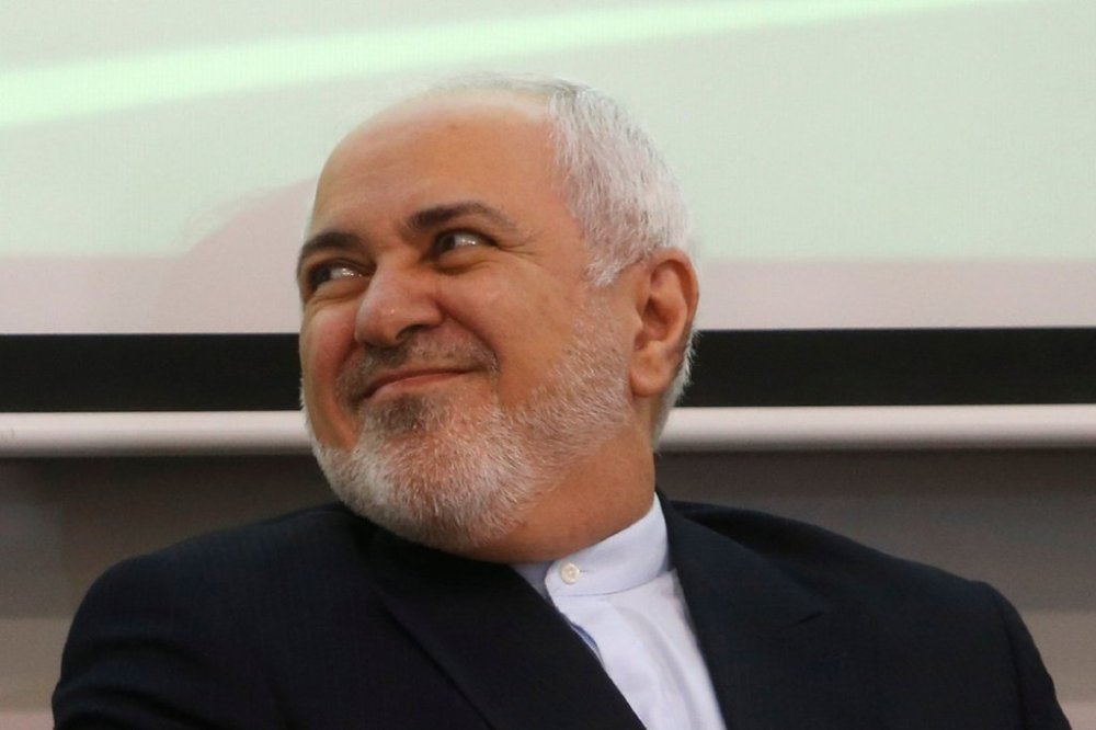 FILE - Iran's Foreign Minister Mohammad Zarif smiles during a meeting with students on a climate change forum at the Gabriel René Moreno Autonomous University, in Santa Cruz Bolivia, on July 23, 2019. (AP Photo/Juan Karita, File)