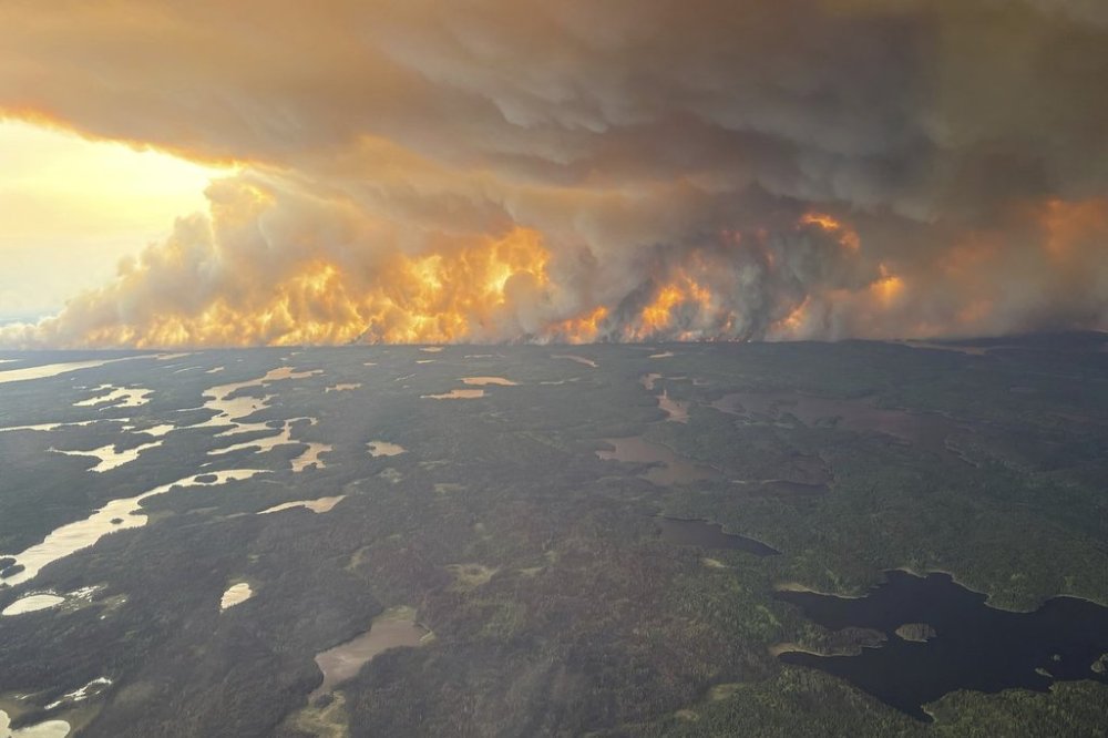This photo provided by the Manitoba government shows wildfires in Flin Flon, Man., on Tuesday, May 27, 2025. (Manitoba government via AP)