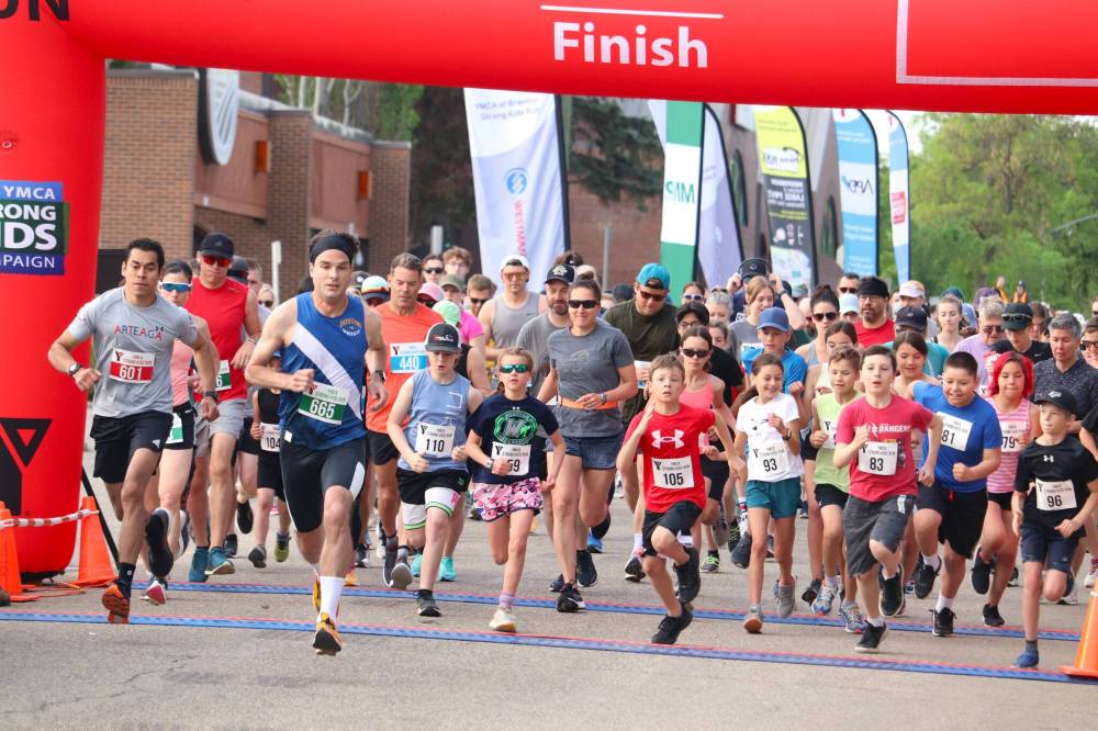 Participants take off from the starting line of the 2023 YMCA Strong Kids Run. This year's edition of the race takes place on Sunday morning outside the YMCA, located at 231 Eighth St. (Kyle Darbyson/The Brandon Sun files)