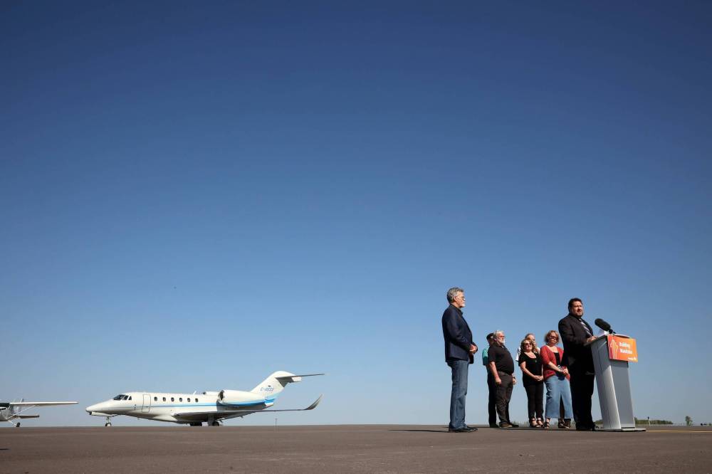 Northern and Municipal Relations Minister Glen Simard speaks during an announcement at the Virden Regional Airport on Monday. The province announced $1.65 million to expand the airport. (Tim Smith/The Brandon Sun)