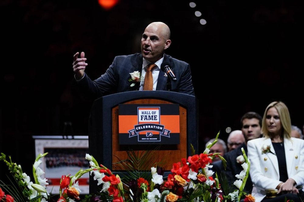 FILE - Rick Tocchet speaks during his induction ceremony into the Philadelphia Flyers' Hall of Fame before an NHL hockey game between the Flyers and the Calgary Flames, Tuesday, Nov. 16, 2021, in Philadelphia. (AP Photo/Matt Slocum, file)