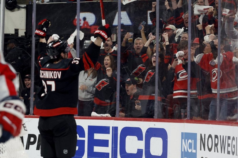 Carolina Hurricanes' Andrei Svechnikov (37) celebrates his goal against the Washington Capitals during the second period of Game 3 of an NHL hockey semifinal round playoff series in Raleigh, N.C., Saturday, May 10, 2025. (AP Photo/Karl DeBlaker)