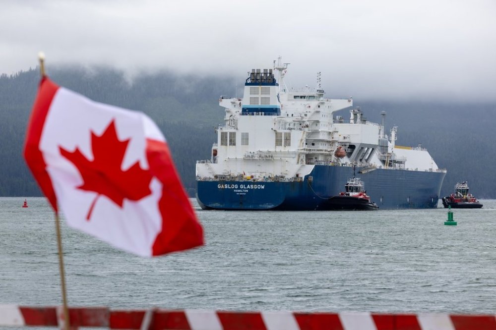 A tanker loaded with the first cargo of Canadian liquefied natural gas departs from Kitimat, B.C. in this Monday, June 30, 2025 photo provided by LNG Canada. THE CANADIAN PRESS/Handout LNG Canada (Mandatory Credit)