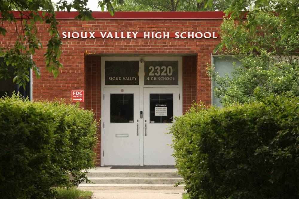 The front entrance of Sioux Valley High School at 2320 Louise Ave. in Brandon. Chief Vincent Tacan says council made the decision to transfer students to portables on the First Nation due to the building’s aging infrastructure, potential asbestos contamination and an outdated boiler-based heating system in the basement. (Tim Smith/The Brandon Sun)