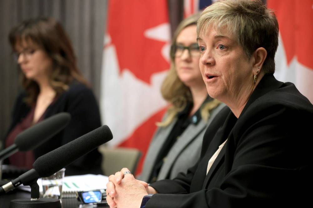 Transportation and Infrastructure Minister Lisa Naylor (right) during a wildfire media briefing at the Manitoba Legislative Building in Winnipeg on Monday. (Ruth Bonneville/Winnipeg Free Press)