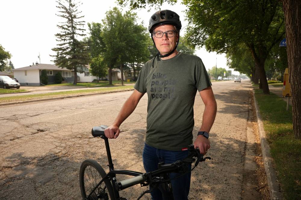 Letter writer Grant Hamilton, a co-founder of Bike Brandon, stands on 26th Street just south of Van Horne Avenue on Wednesday. (Tim Smith/The Brandon Sun files)