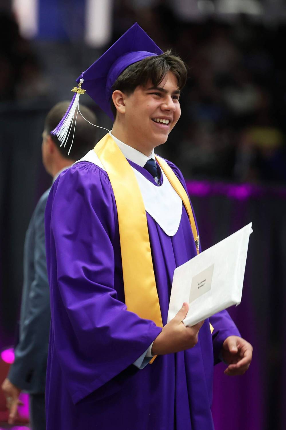 Grade 12 graduate Andrew Badea smiles after receiving his diploma during Monday’s graduation ceremony. (Tim Smith/The Brandon Sun)