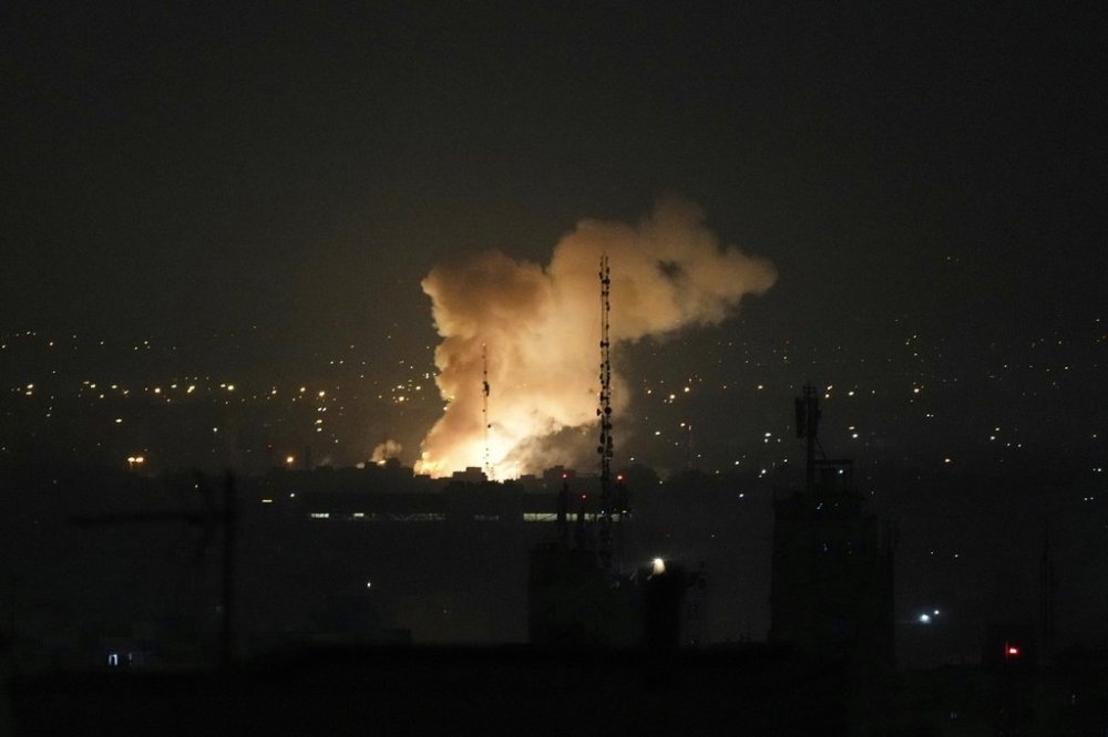 Smoke rises up after an explosion in Tehran, Iran on Friday, June 13, 2025. (AP Photo/Vahid Salemi)