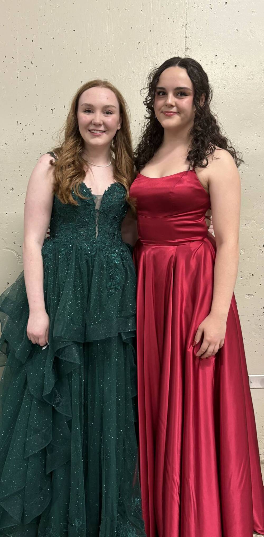 Twins Julianna (left) and Annika Laluk pose for a picture after their graduation ceremony at the Keystone Centre. They describe their high school journey as one filled with closeness and a deepening bond. (Submitted)