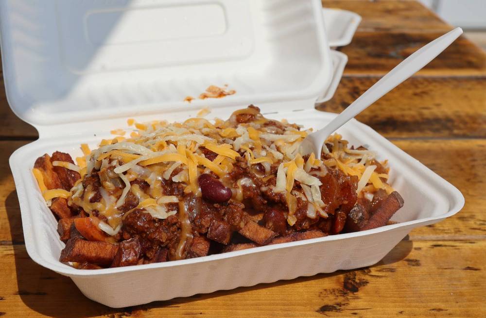 The chili cheese fries at Uncle Tom’s Burgers in Neepawa are served with homemade chili and a sprinkle of cheddar cheese on top.