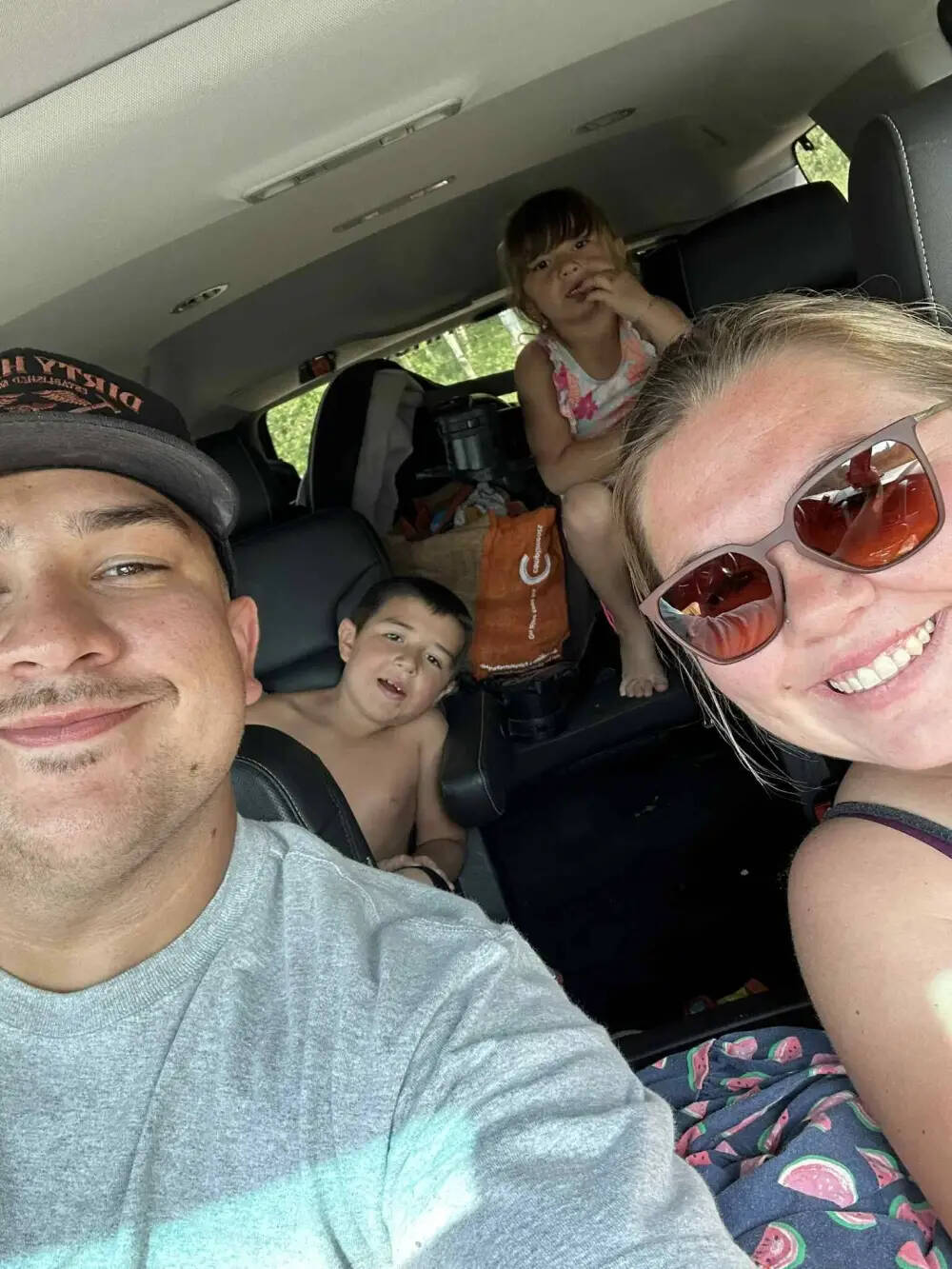 Preston Houle, with fiancée, April, and their children, Carson and Kaylee, on July 18 before Houle saved a stranger’s child from nearly drowning at Delta Beach north of Portage la Prairie. (Supplied)