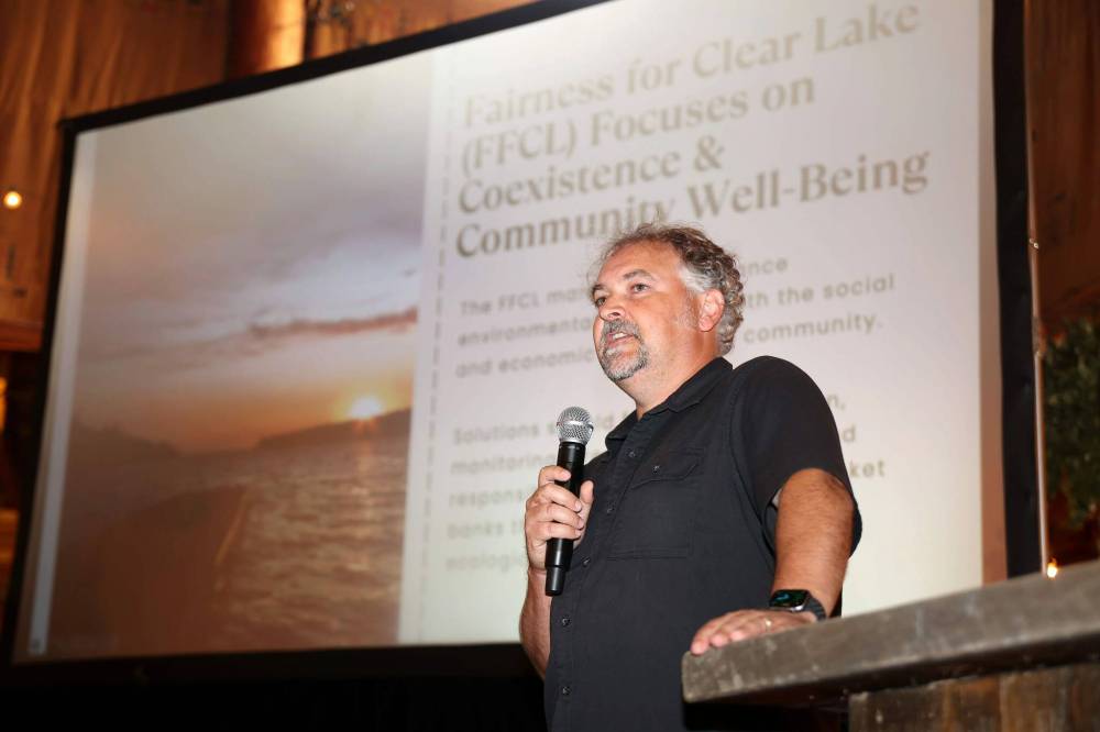 Mark Lowdon, a fisheries biologist and owner of AEE Tech Services Inc., speaks during Tuesday's town hall. (Tim Smith/The Brandon Sun)