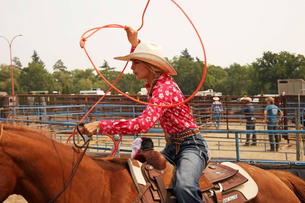 Reese Colgate of Williams Lake, B.C., looks to rope a calf in the junior high breakaway roping event. (Tim Smith/The Brandon Sun)