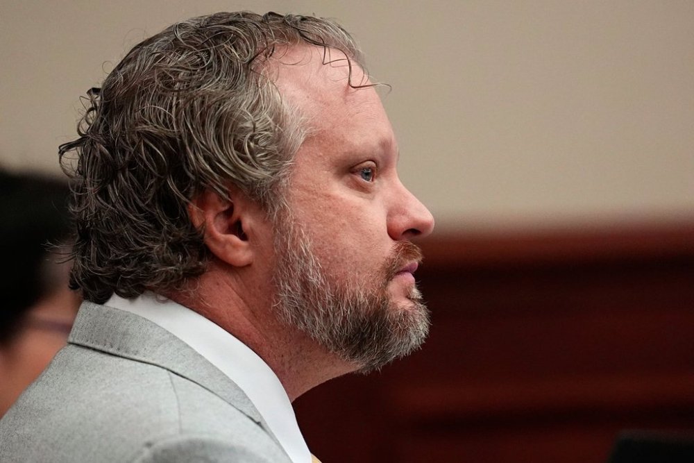 Dentist James Craig listens to closing arguments during his murder trial in district court in Arapahoe County, Tuesday, July 29, 2025, in Centennial, Colo. (AP Photo/David Zalubowski, Pool)