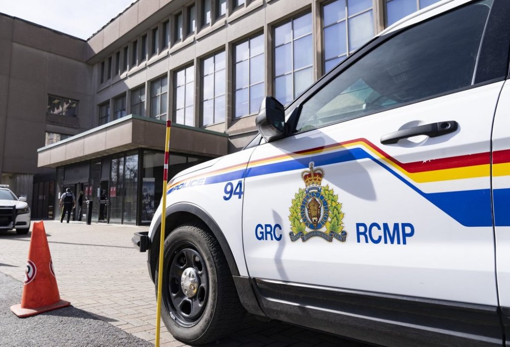 An RCMP logo in shown on a police vehicle. (The Canadian Press files)