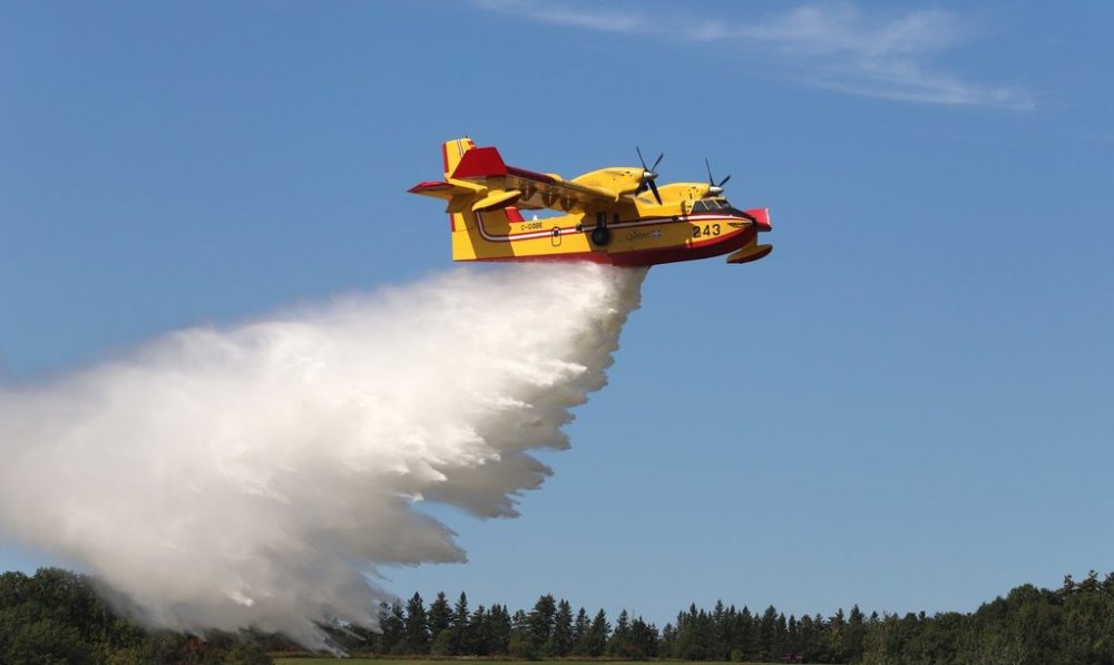 A CL415 water bomber performs at the Aero Gatineau Ottawa air show in Gatineau on Sept. 16, 2023. (The Canadian Press)