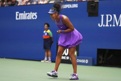 Naomi Osaka, of Japan, reacts during a match against Coco Gauff, of the United States, in the fourth round of the US Open tennis championships, Monday, Sept. 1, 2025, in New York. (AP Photo/Kirsty Wigglesworth)