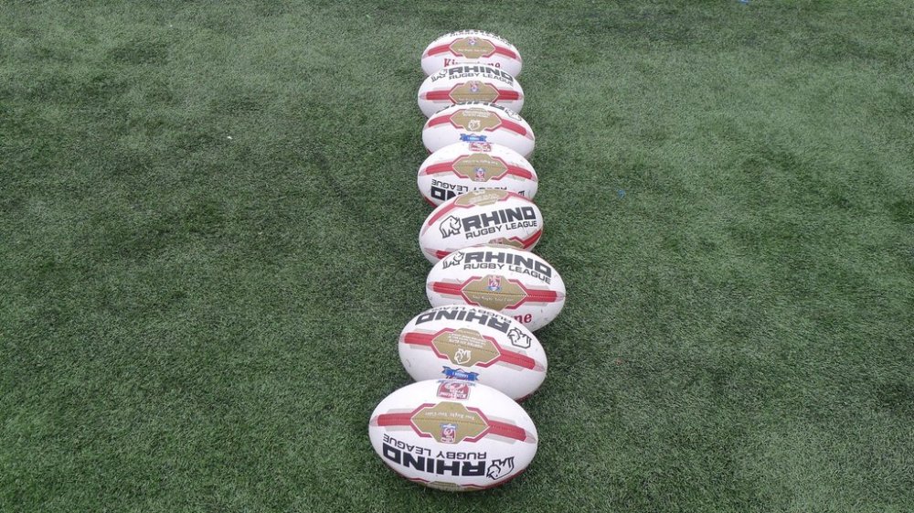 Rugby balls are seen lined up on a pitch at Toronto’s Lamport Stadium in a May 2017 photo. The Canada Ravens are preparing for an October World Cup qualifier in Brampton, Ont., with a pair of games in Fiji. THE CANADIAN PRESS/Neil Davidson