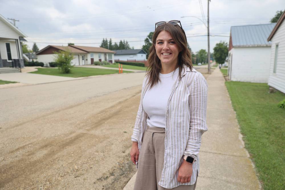Glenboro resident Melanie Christison poses for a photo as she walks along Stewart Avenue in Holland on Tuesday.