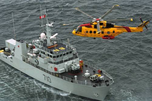 HMCS Brandon is seen on the Straits of Georgia on Canada’s West Coast during a training exercise with a search-and-rescue helicopter. (The Brandon Sun files)