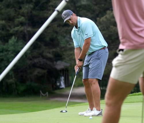 LEFT: Cal Vanderschuit putts on the ninth green during Tamarack golf tournament men’s championship flight action at Clear Lake Golf Course on Tuesday. RIGHT: Brandon’s Ross Sheard beat Dustin Schneider 3 and 2 in men’s championship flight action on Tuesday. (Photos by Thomas Friesen/The Brandon Sun)