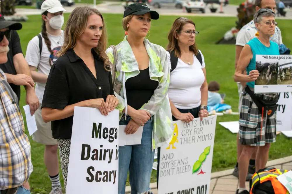 A rally to oppose Riverview’s mega-dairies that could threaten the Red River Watershed takes place on the grounds of the Manitoba Legislative Building in Winnipeg, Thursday. (Brook Jones/Winnipeg Free Press)