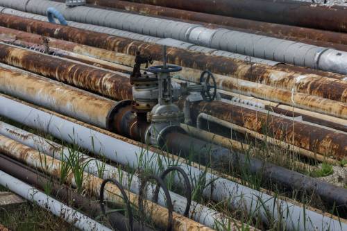 Pipes lead to an Imperial Oil Ltd. refinery near the Enbridge Line 5 pipeline in Sarnia, Ontario in May 2021. Some argue more fossil fuel infrastructure is needed by the province and country to build their economies, but James Wilt argues that’s not the way to go. (Bloomberg files)