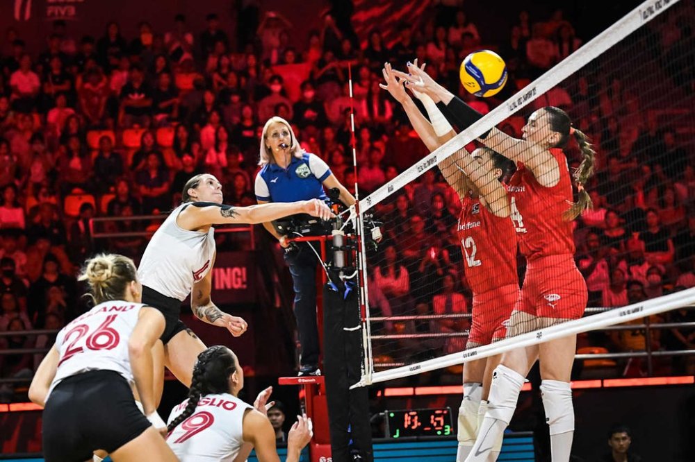 Canada's Vicky Savard (4) spikes the ball against Turkey, in this handout photo, at the women's volleyball world championships in Nakhon Ratchasima, Thailand, on Wednesday, Aug. 27, 2025. Canada suffered its first loss, falling 3-0 (25-21, 27-25, 25-13) to Turkey. THE CANADIAN PRESS/Handout - Volleyball Canada (Mandatory Credit)