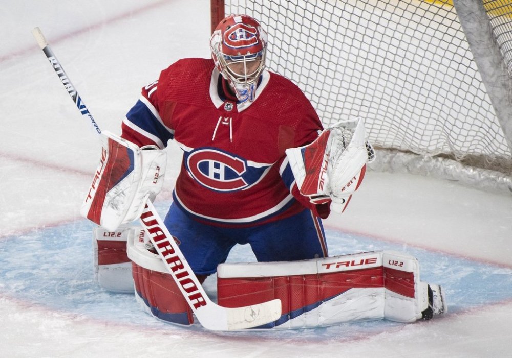 Canadiens goaltender Carey Price warms up before an NHL game against the New York Islanders in Montreal on Friday, April 15, 2022. THE CANADIAN PRESS/Graham Hughes