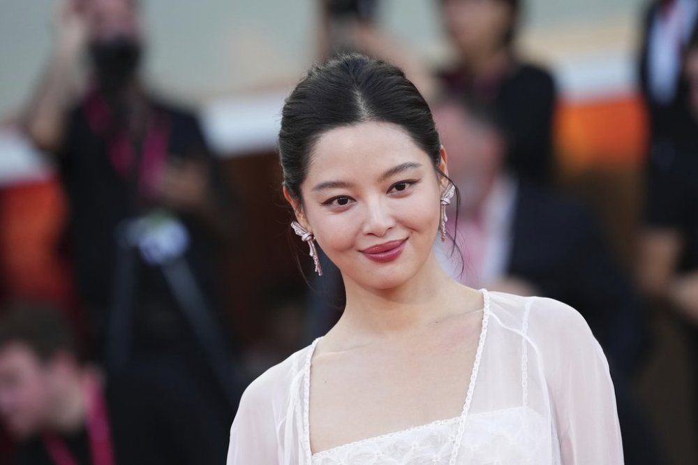 Xin Zhilei poses for photographers upon arrival at the awards ceremony of the 82nd edition of the Venice Film Festival in Venice, Italy, on Saturday, Sept. 6, 2025. (Photo by Scott A Garfitt/Invision/AP)