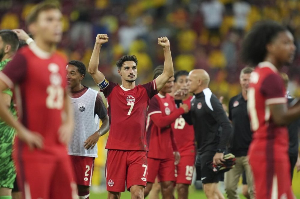 Canada's Stephen Eustaquio celebrates after an international friendly soccer match between Romania and Canada at the National Arena stadium in Bucharest, Romania, Friday, Sept. 5, 2025. (AP Photo/Andreea Alexandru)