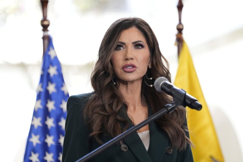 U.S. Homeland Security Secretary Kristi Noem, with Ecuador's Minister of Interior John Reinberg, not shown, speaks during a press briefing at the Ecuadorian Presidential Palace, Thursday, July 31, 2025, in Quito, Ecuador. (AP Photo/Alex Brandon, Pool)