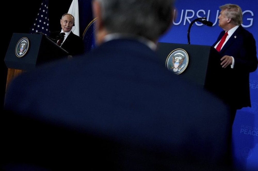 President Donald Trump listens as Russia's President Vladimir Putin speaks during a news conference at Joint Base Elmendorf- Richardson, Friday, Aug. 15, 2025, in Anchorage, Alaska. (AP Photo/Julia Demaree Nikhinson)
