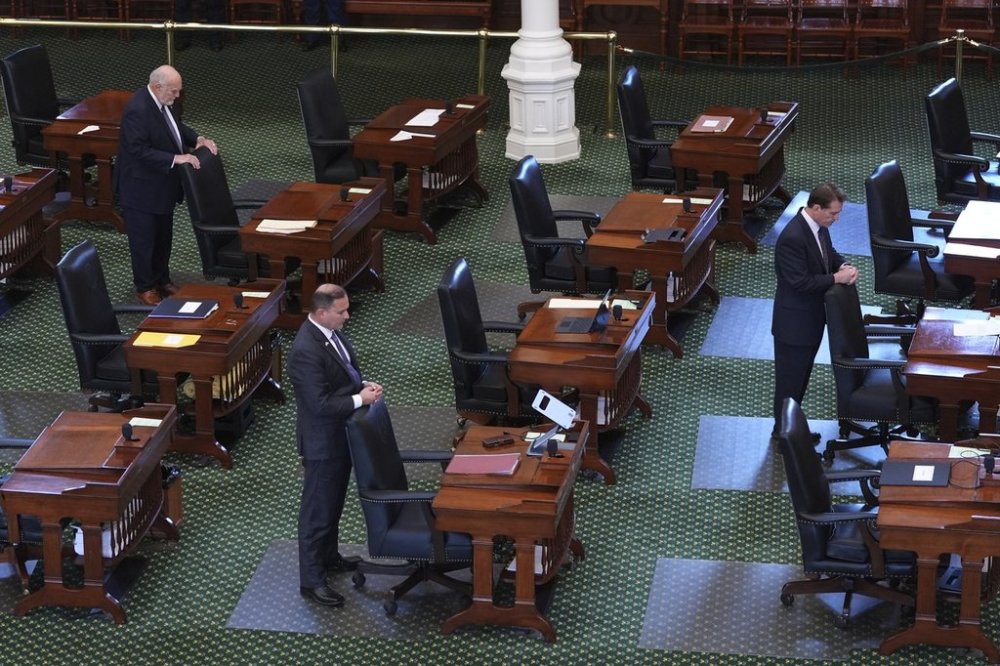 Texas state Sen. Robert Nichols, R-Jacksonville, left, Adam Hinojosa, R-Corpus Christi, center, and Brent Hagenbuch, R-Denton, right, pray with other senators as they prepare to debate a bills including one that would add new abortion restrictions, Wednesday, Sept. 3, 2025, in Austin, Texas. (AP Photo/Eric Gay)