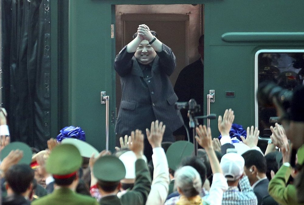 FILE - North Korean leader Kim Jong Un waves from his train as he arrives at the railway station in Dong Dang, Vietnam, on March 2, 2019, for an expected meeting with President Trump. (AP Photo/Minh Hoang, File)