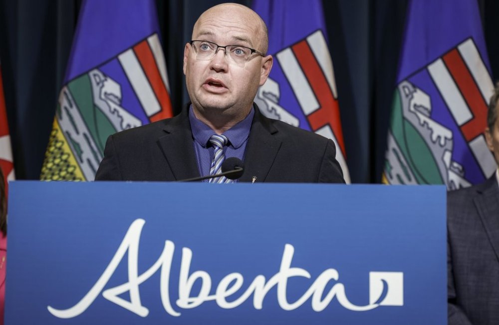 Alberta Minister of Children and Family Services Searle Turton speaks to the media about an E. coli outbreak linked to multiple Calgary daycares surpassing 200 cases in Calgary on Tuesday, Sept. 12, 2023. THE CANADIAN PRESS/Jeff McIntosh