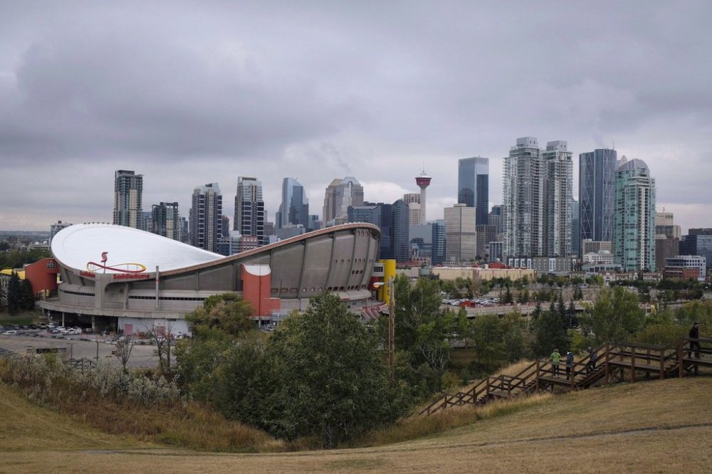 The Calgary Real Estate Board says home sales in the city declined 8.8 per cent in August compared with last year but remained above long-term trends, reflecting relatively strong demand. The Calgary skyline is seen on Friday, Sept. 15, 2017. THE CANADIAN PRESS/Jeff McIntosh