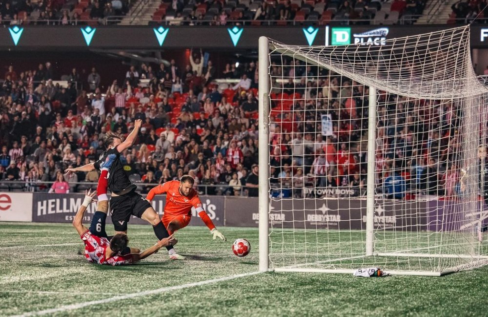 Atletico Ottawa forward Samuel Salter (in black) is shown scoring his 15th goal of the season, setting a single-season record in the Canadian Premier League. The goal was initially credited as an own goal by Vancouver FC’s Aidan O’Connor but was changed to Salter by the league upon review. Ottawa won the game 3-1 on Aug. 30, 2025, at TD Place.
THE CANADIAN PRESS/Handout — Atletico Ottawa-Philippe Lariviere (Mandatory Credit)
