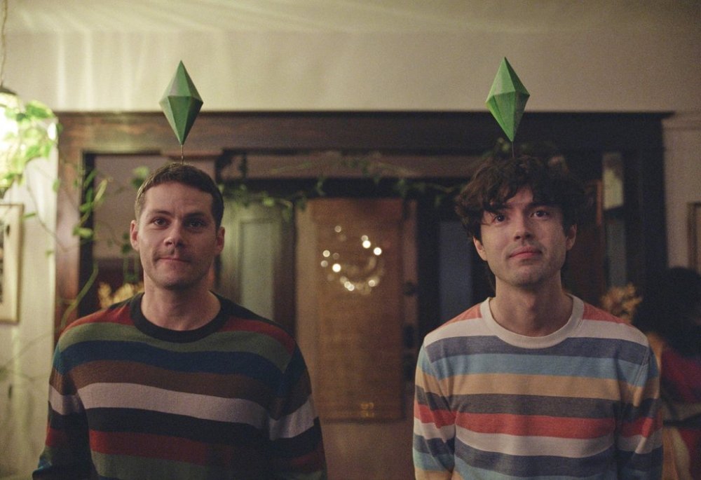 This image released by Roadside Attractions shows Dylan O'Brien, left, and James Sweeney in a scene from