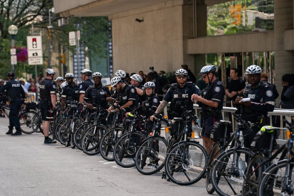 Police gather in anticipation of Pro-Palestinian protesters outside of Roy Thomson Hall during Toronto International Film Festival in Toronto on Wednesday, September 10, 2025. THE CANADIAN PRESS/Arlyn McAdorey