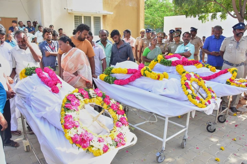 Relatives of people who were killed in a stampede during a rally for a popular Indian actor and politician, mourn as they take the bodies from a hospital, in Karur, in the southern state of Tamil Nadu, Sunday, Sept. 28, 2025. (AP Photo)