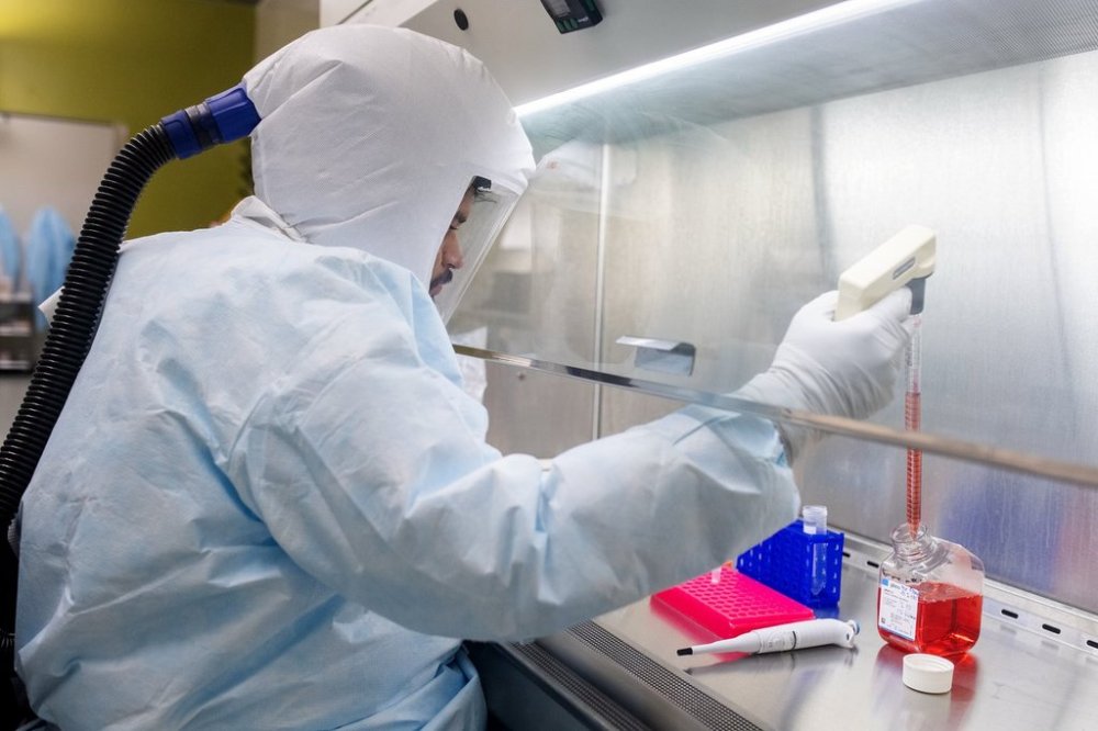 Vaccine and Infectious Disease Organization (VIDO) researchers demonstrate work in a Containment Level 3 lab during a tour of the building on the University of Saskatchewan in Saskatoon, Sask. on Thursday, August 21, 2025. THE CANADIAN PRESS/Liam Richards