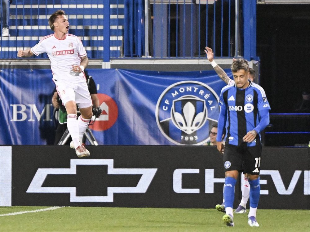 St. Louis City's Conrad Wallem, left, reacts after scoring against CF Montreal during first half MLS soccer action in Montreal, Saturday, Sept. 13, 2025. THE CANADIAN PRESS/Graham Hughes